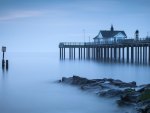 beautiful pier in a misty sea