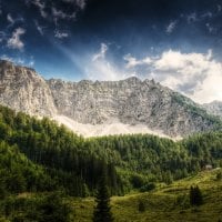 cabins in the austrian alps in summer hdr