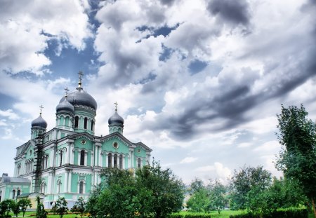 magnificent orthodox church - clouds, trees, green, domes, church