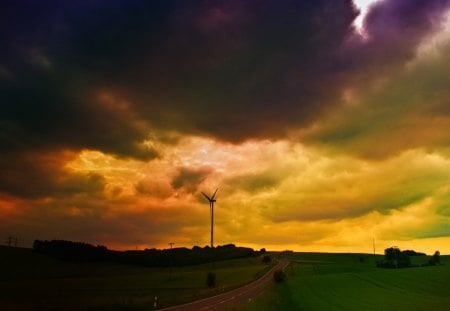 storm clouds over a turbine in the countryside - storm, clouds, fields, road, turbine