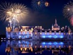 fireworks above a palace on a lake