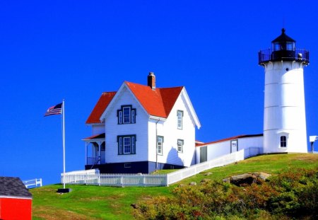 blue sky over american lighthouse - lighthouse, blue, grass, flag, sky