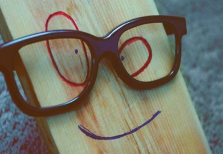 Smiley woody - wood, eyeglasses, moods, table, smile, write, pen, happy