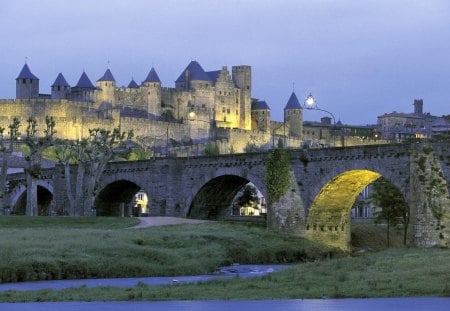 ancient massive castle at sudk - hill, castle, river, bridge, dusk, lights