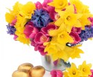 Flower spring with chocolate golden Easter eggs