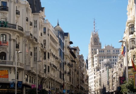 Madrid Street - street, buldings, church, clock, signs