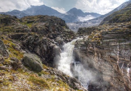 waterfall at a river gorge down from a glacier - waterfall, glacier, mountains, gorge, rocks