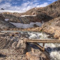 bridge over a runoff stream from a glacier