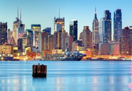 the enterprise on manhattan's west side - river, aircraft carriers, city, piers, skyscrapers