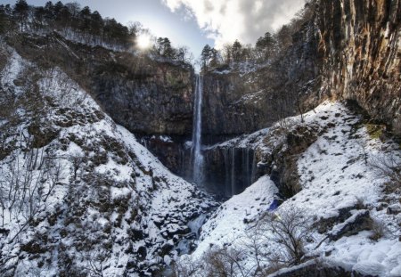 amazing waterfall into a ravine in winter - cliff, winter, ravine, sunrise, waterfall