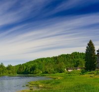 wooden church by a river