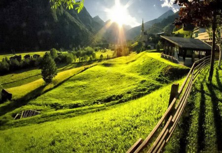 sunbeams on a village in an alpine valley - mountains, sunbeams, valley, village, grass