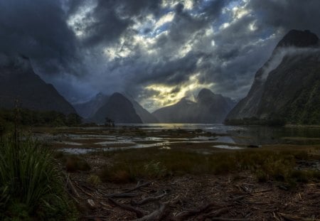 gloomy dark clouds draping mountains - mountains, lake, gloomy, clouds