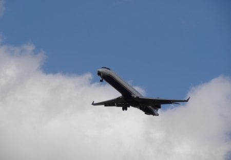 Coming in From the Clouds - plane, clouds, jet, sky