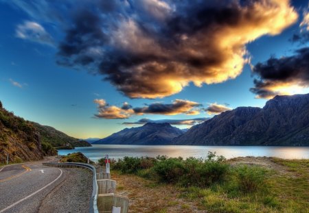 highway winding around a lake hdr - clouds, highway, hdr, lake, mountains