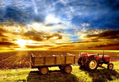 Sunrise in the country - farm field, farm tractor, wagon, clouds, sunrise