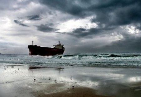 tanker ship aground on a beach