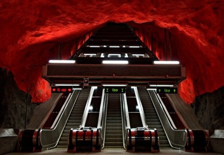 escalators in metro station in sweden called hell's mouth - tunnel, escalators, station, red