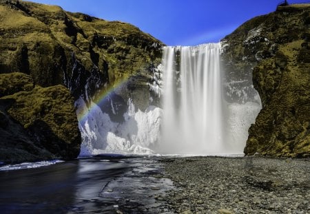 rainbow by a beautiful waterfall - rainbow, cliff, river, waterfall, rocks