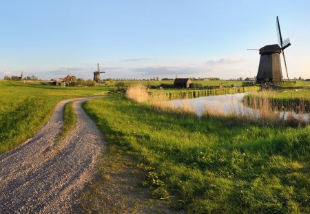 road among windmills on farms - windmills, farms, road, river