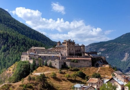 fantastic castle on a hill in a valley - mountains, hill, valley, wall, village, castle