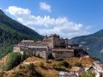 fantastic castle on a hill in a valley