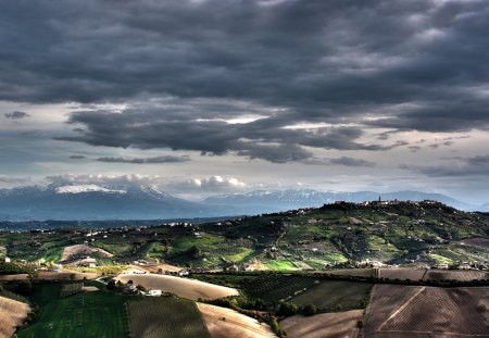 Farmers Fields - mountains, farmers, blue, patchwork, sky, land, clouds, fields, nature, day, green