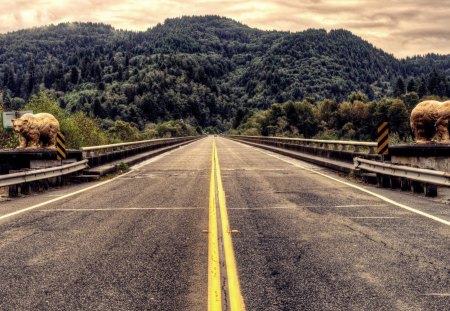 two bears guarding a highway bridge - highway, forest, mountain, bridge, bears statues