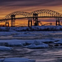 dual bridges over a river in winter