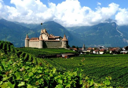 castle surrounded by vineyards in switzerland - village, clouds, vineyards, mountains, castle