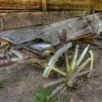 old wooden horse wagon with a flat tire hdr