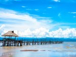 lovely simple sea pier under beautiful sky