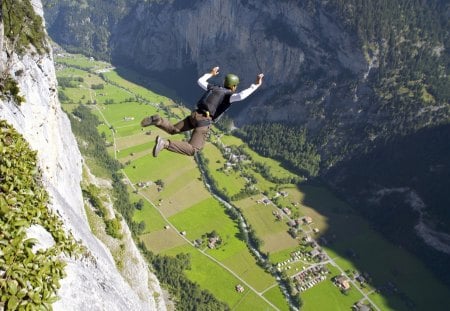 base jumping in amazing valley in switzerland - mountains, village, valley, skydiving