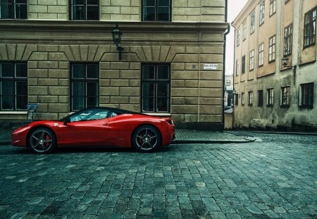 red ferrari parked on a street - red, stree, car, bricks, buildings