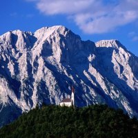 glorious mountain above a church on a hill