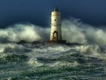 amazing lighthouse in ocean waves