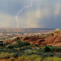 lightning in a rain storm in arches np utah