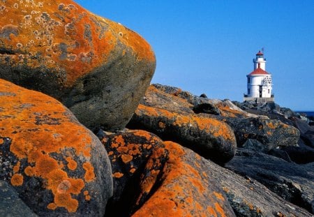 Stony Cliff - lighthouse, stones, water, sea