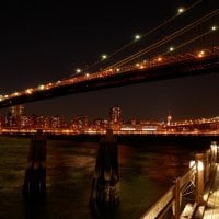 under the brooklyn bridge at night