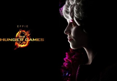 Elizabeth Banks as Effie Trinket