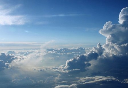 Between the clouds - white, nature, sky, cloud, blue, day, light, sun