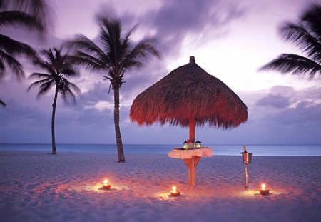 Romantic Setting - umbrella, palms, sunset, beach, romantic, candlelight