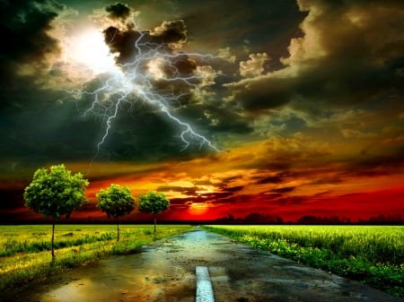 Lightning in the sky - sky, trees, roadway, colorful, road, storm, amazing, evening, clouds, dusk, grass, rays, rain, summer, lovely, fiery, beautiful, photo manipulation, lightning