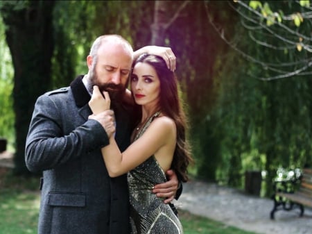 Halit Ergenc and Nur Aysan - actor, turkish, halit ergenc, dress, girl, beauty, man, tree, actress, nur aysan, nature, green, woman, park