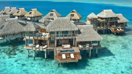 the best hilton resort in bora bora - bungalows, balconies, sea, resort, stilts