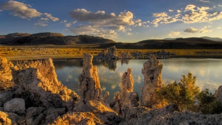 sandstone pillars in a california lake - pillars, clouds, lake, sandstone