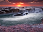 fantastic rocky shore at sunset