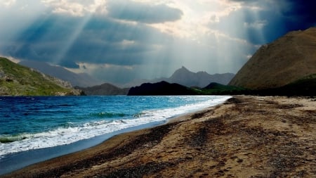 sunbeams on a lovely sea cove beach - clouds, cove, beach, sunbeams, mountains