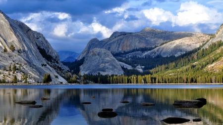 wonderful nature landscape - clouds, lake, forest, mountains, rocks