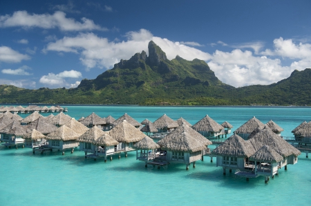 St Regis Resort Bora Bora Water Villas Bungalows over Blue Lagoon - St Regis, villas, lagoon, Tahiti, blue, beach, room, island, sand, villa, holiday, bungalow, peak, atoll, exotic, mountiain, paradise, hotel, luxury, bungalows, water, volcano, reef, sea, resort, ocean, rooms, Bora Bora, islands, coral, tropical, retreat